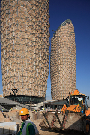 The Al Bahar Towers under construction, Abu Dhabi, UAE, designed by Aedas for the Abu Dhabi Investment Council (ADIC)