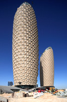 The Al Bahar Towers under construction, Abu Dhabi, UAE, designed by Aedas for the Abu Dhabi Investment Council (ADIC)