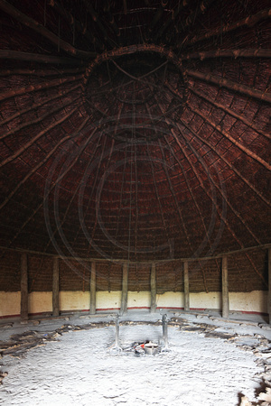 Interior of an Iron Age roundhouse reconstructed at Butser Ancient Farm, Hampshire