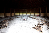 Interior of an Iron Age roundhouse reconstructed at Butser Ancient Farm, Hampshire